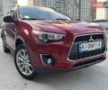Червоний Міцубісі Аутлендер, об'ємом двигуна 2 л та пробігом 96 тис. км за 10950 $, фото 1 на Automoto.ua