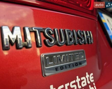 Червоний Міцубісі Аутлендер, об'ємом двигуна 2 л та пробігом 96 тис. км за 10950 $, фото 48 на Automoto.ua
