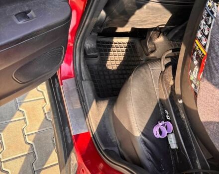 Красный Мицубиси Аутлендер, объемом двигателя 2 л и пробегом 200 тыс. км за 9100 $, фото 6 на Automoto.ua