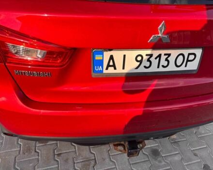 Красный Мицубиси Аутлендер, объемом двигателя 2 л и пробегом 200 тыс. км за 9100 $, фото 5 на Automoto.ua