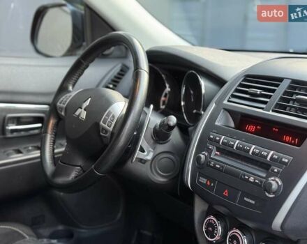 Червоний Міцубісі Аутлендер, об'ємом двигуна 2 л та пробігом 96 тис. км за 10950 $, фото 12 на Automoto.ua