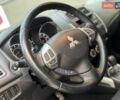 Червоний Міцубісі Аутлендер, об'ємом двигуна 2 л та пробігом 96 тис. км за 10950 $, фото 25 на Automoto.ua