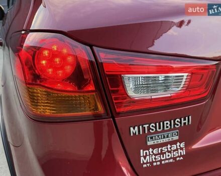 Червоний Міцубісі Аутлендер, об'ємом двигуна 2 л та пробігом 96 тис. км за 10950 $, фото 34 на Automoto.ua