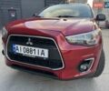 Червоний Міцубісі Аутлендер, об'ємом двигуна 2 л та пробігом 96 тис. км за 10950 $, фото 40 на Automoto.ua