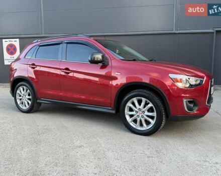Червоний Міцубісі Аутлендер, об'ємом двигуна 2 л та пробігом 96 тис. км за 10950 $, фото 8 на Automoto.ua