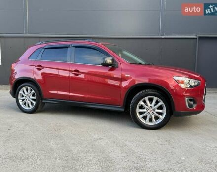 Червоний Міцубісі Аутлендер, об'ємом двигуна 2 л та пробігом 96 тис. км за 10950 $, фото 51 на Automoto.ua