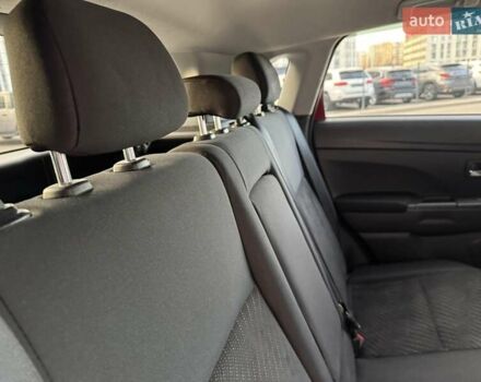 Червоний Міцубісі Аутлендер, об'ємом двигуна 2 л та пробігом 96 тис. км за 10950 $, фото 21 на Automoto.ua