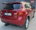 Червоний Міцубісі Аутлендер, об'ємом двигуна 2 л та пробігом 96 тис. км за 10950 $, фото 37 на Automoto.ua