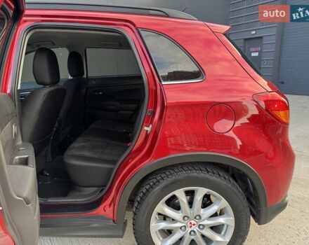 Червоний Міцубісі Аутлендер, об'ємом двигуна 2 л та пробігом 96 тис. км за 10950 $, фото 27 на Automoto.ua