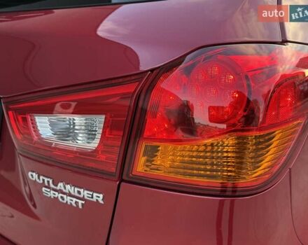 Червоний Міцубісі Аутлендер, об'ємом двигуна 2 л та пробігом 96 тис. км за 10950 $, фото 35 на Automoto.ua