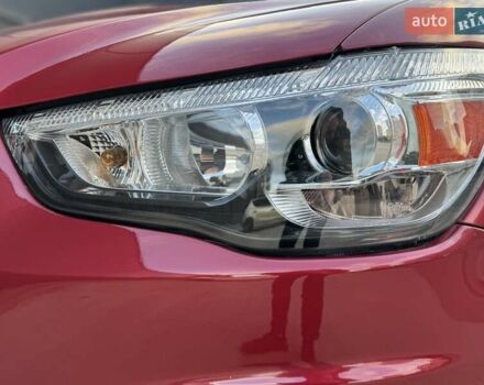 Червоний Міцубісі Аутлендер, об'ємом двигуна 2 л та пробігом 96 тис. км за 10950 $, фото 43 на Automoto.ua