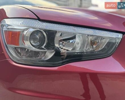 Червоний Міцубісі Аутлендер, об'ємом двигуна 2 л та пробігом 96 тис. км за 10950 $, фото 42 на Automoto.ua