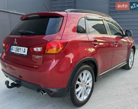 Червоний Міцубісі Аутлендер, об'ємом двигуна 2 л та пробігом 96 тис. км за 10950 $, фото 36 на Automoto.ua