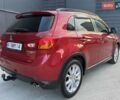 Червоний Міцубісі Аутлендер, об'ємом двигуна 2 л та пробігом 96 тис. км за 10950 $, фото 36 на Automoto.ua