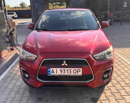 Красный Мицубиси Аутлендер, объемом двигателя 2 л и пробегом 200 тыс. км за 9100 $, фото 7 на Automoto.ua