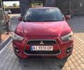 Красный Мицубиси Аутлендер, объемом двигателя 2 л и пробегом 200 тыс. км за 9100 $, фото 7 на Automoto.ua