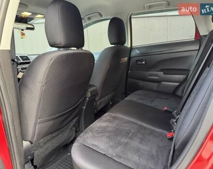 Червоний Міцубісі Аутлендер, об'ємом двигуна 2 л та пробігом 96 тис. км за 10950 $, фото 23 на Automoto.ua