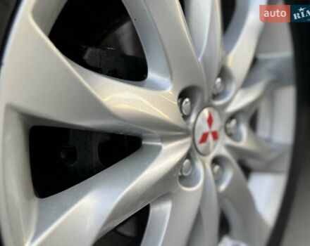 Червоний Міцубісі Аутлендер, об'ємом двигуна 2 л та пробігом 96 тис. км за 10950 $, фото 44 на Automoto.ua