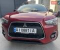 Червоний Міцубісі Аутлендер, об'ємом двигуна 2 л та пробігом 96 тис. км за 10950 $, фото 41 на Automoto.ua