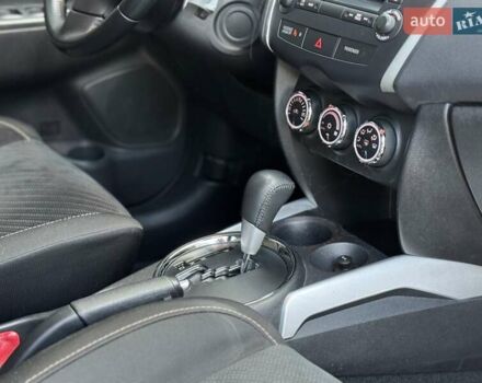 Червоний Міцубісі Аутлендер, об'ємом двигуна 2 л та пробігом 96 тис. км за 10950 $, фото 15 на Automoto.ua