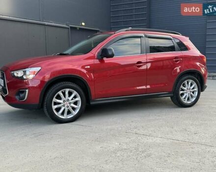 Червоний Міцубісі Аутлендер, об'ємом двигуна 2 л та пробігом 96 тис. км за 10950 $, фото 39 на Automoto.ua