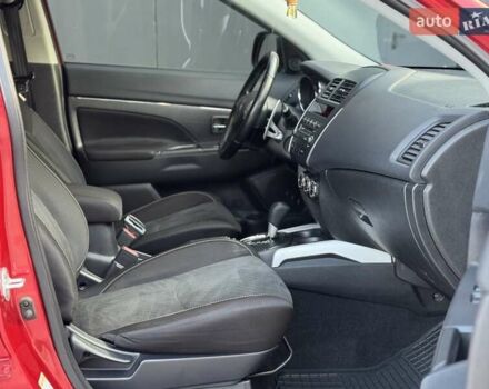 Червоний Міцубісі Аутлендер, об'ємом двигуна 2 л та пробігом 96 тис. км за 10950 $, фото 14 на Automoto.ua