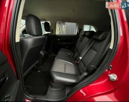 Красный Мицубиси Аутлендер, объемом двигателя 2.2 л и пробегом 225 тыс. км за 14600 $, фото 2 на Automoto.ua