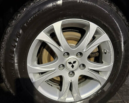 Червоний Міцубісі Аутлендер, об'ємом двигуна 2.27 л та пробігом 238 тис. км за 15800 $, фото 5 на Automoto.ua