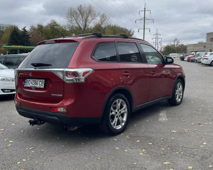 Червоний Міцубісі Аутлендер, об'ємом двигуна 2.36 л та пробігом 149 тис. км за 12500 $, фото 4 на Automoto.ua