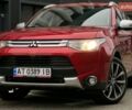 Красный Мицубиси Аутлендер, объемом двигателя 2.2 л и пробегом 225 тыс. км за 14600 $, фото 1 на Automoto.ua
