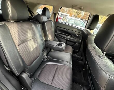 Красный Мицубиси Аутлендер, объемом двигателя 2.4 л и пробегом 213 тыс. км за 11900 $, фото 4 на Automoto.ua