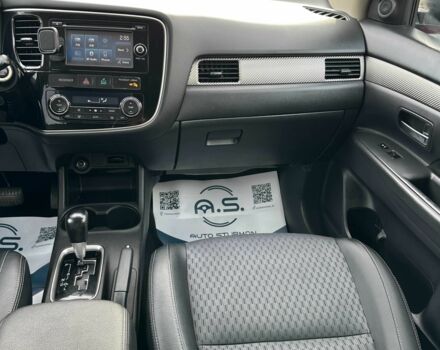 Красный Мицубиси Аутлендер, объемом двигателя 2.4 л и пробегом 213 тыс. км за 11900 $, фото 7 на Automoto.ua