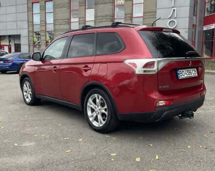 Червоний Міцубісі Аутлендер, об'ємом двигуна 2.36 л та пробігом 149 тис. км за 12500 $, фото 5 на Automoto.ua