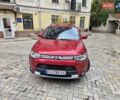 Красный Мицубиси Аутлендер, объемом двигателя 3 л и пробегом 119 тыс. км за 15000 $, фото 1 на Automoto.ua