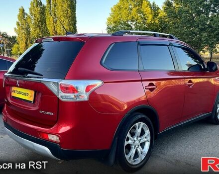 Красный Мицубиси Аутлендер, объемом двигателя 2.4 л и пробегом 209 тыс. км за 12990 $, фото 3 на Automoto.ua