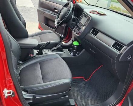 Красный Мицубиси Аутлендер, объемом двигателя 2.2 л и пробегом 225 тыс. км за 14600 $, фото 5 на Automoto.ua