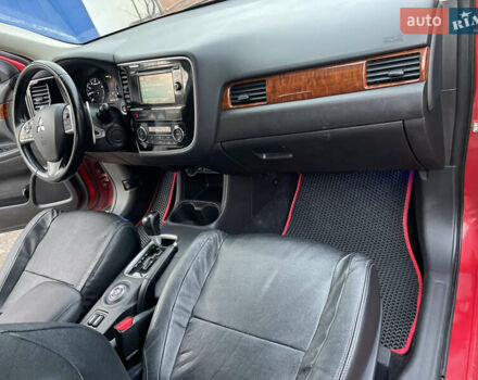 Красный Мицубиси Аутлендер, объемом двигателя 3 л и пробегом 230 тыс. км за 13900 $, фото 26 на Automoto.ua