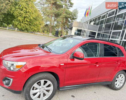 Красный Мицубиси Аутлендер, объемом двигателя 2 л и пробегом 210 тыс. км за 13500 $, фото 6 на Automoto.ua