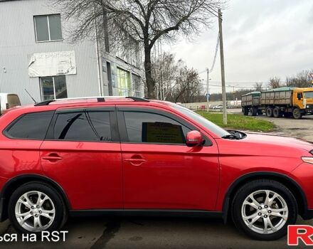 Красный Мицубиси Аутлендер, объемом двигателя 2.4 л и пробегом 209 тыс. км за 13500 $, фото 3 на Automoto.ua