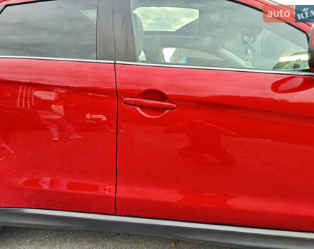 Красный Мицубиси Аутлендер, объемом двигателя 2 л и пробегом 210 тыс. км за 13500 $, фото 4 на Automoto.ua