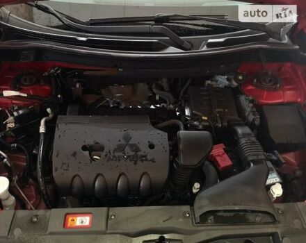 Червоний Міцубісі Аутлендер, об'ємом двигуна 2.36 л та пробігом 107 тис. км за 12200 $, фото 32 на Automoto.ua