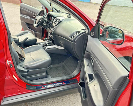 Красный Мицубиси Аутлендер, объемом двигателя 2 л и пробегом 210 тыс. км за 13500 $, фото 11 на Automoto.ua