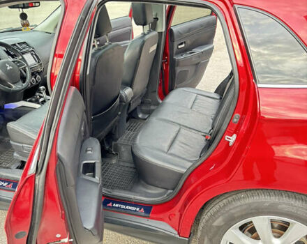 Красный Мицубиси Аутлендер, объемом двигателя 2 л и пробегом 210 тыс. км за 13500 $, фото 12 на Automoto.ua