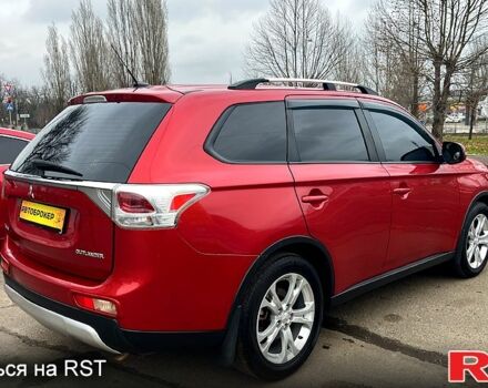 Красный Мицубиси Аутлендер, объемом двигателя 2.4 л и пробегом 209 тыс. км за 13500 $, фото 6 на Automoto.ua