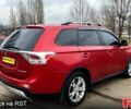 Красный Мицубиси Аутлендер, объемом двигателя 2.4 л и пробегом 209 тыс. км за 13500 $, фото 6 на Automoto.ua