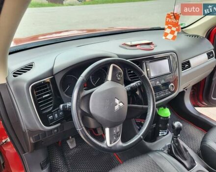 Красный Мицубиси Аутлендер, объемом двигателя 2.2 л и пробегом 225 тыс. км за 14600 $, фото 7 на Automoto.ua