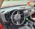 Красный Мицубиси Аутлендер, объемом двигателя 2.2 л и пробегом 225 тыс. км за 14600 $, фото 7 на Automoto.ua
