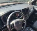 Красный Мицубиси Аутлендер, объемом двигателя 2.4 л и пробегом 85 тыс. км за 9000 $, фото 4 на Automoto.ua