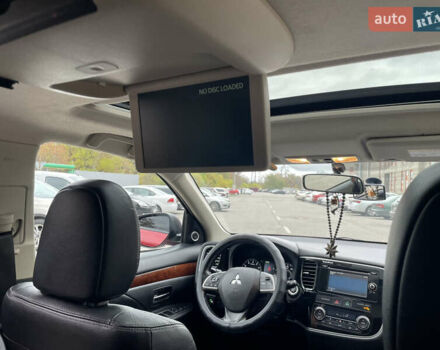 Червоний Міцубісі Аутлендер, об'ємом двигуна 2.36 л та пробігом 149 тис. км за 12500 $, фото 11 на Automoto.ua