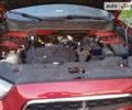 Червоний Міцубісі Аутлендер, об'ємом двигуна 2 л та пробігом 205 тис. км за 10900 $, фото 12 на Automoto.ua
